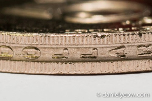 A close up of the size of a Hong Kong five dollar coin